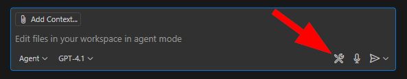 A screenshot from VS Code of the Copilot prompt text box set to use Agent mode and an arrow pointing at the Configure Tools wrench icon.
